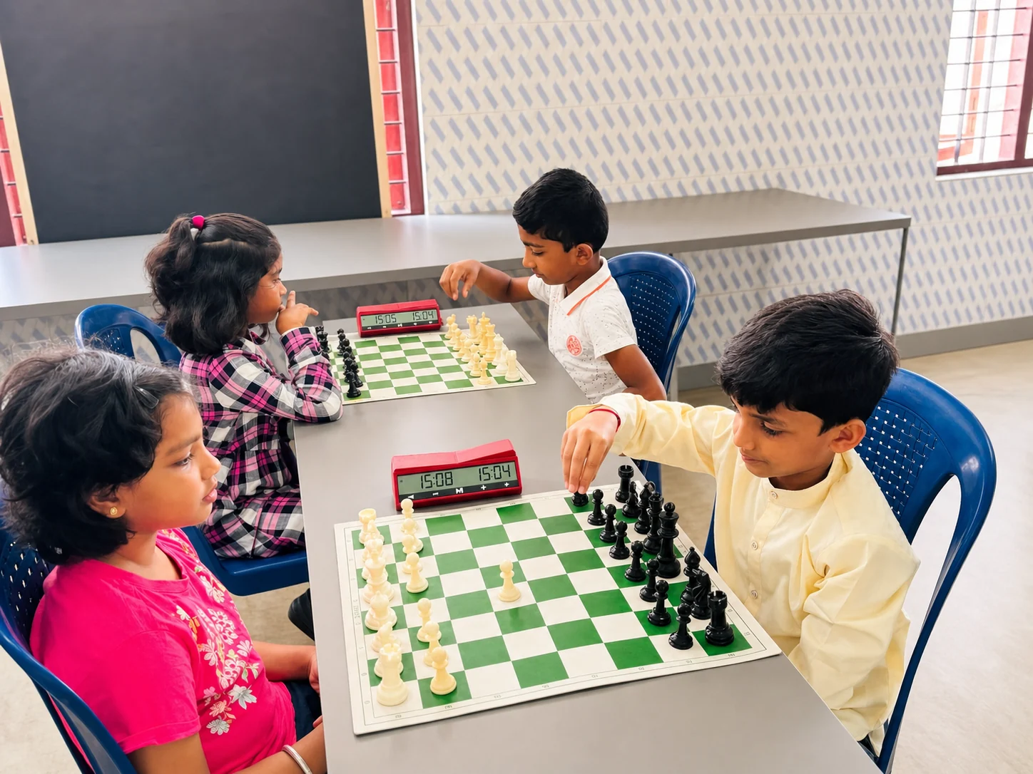 Chess Forge students preparing with tournament practice games