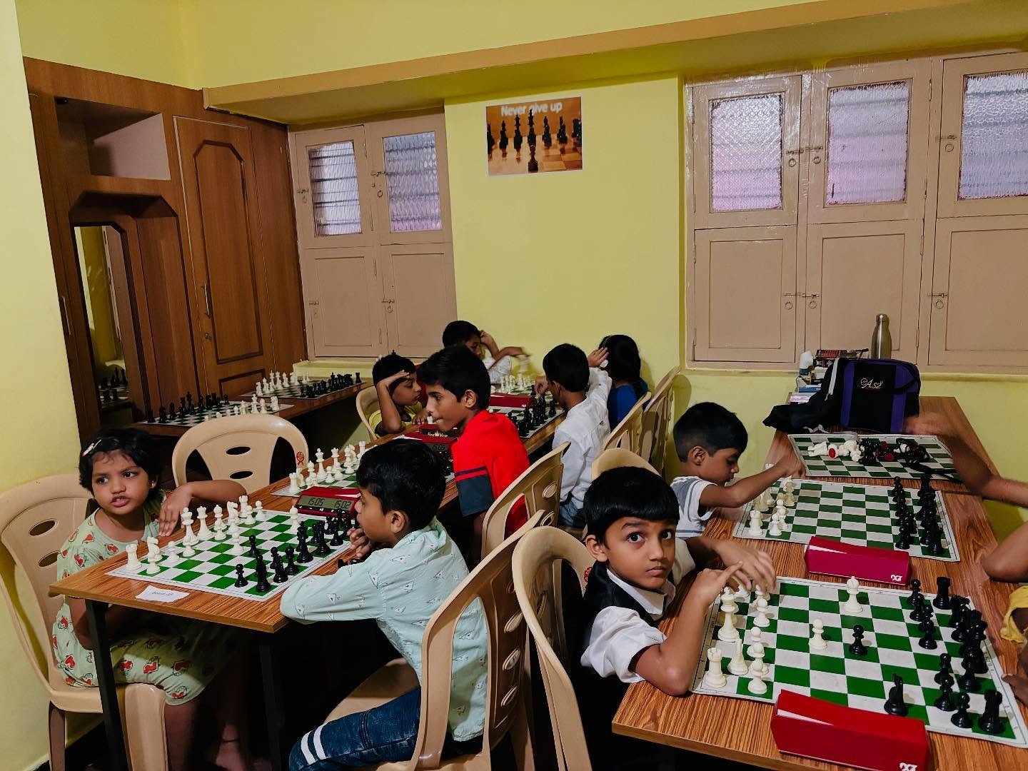 Chess Forge student receiving an achievement award