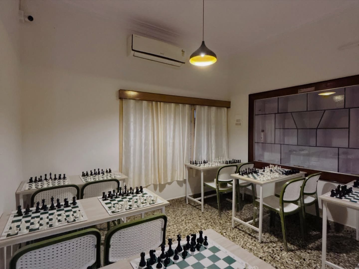 Chess classroom arranged with boards ready for students