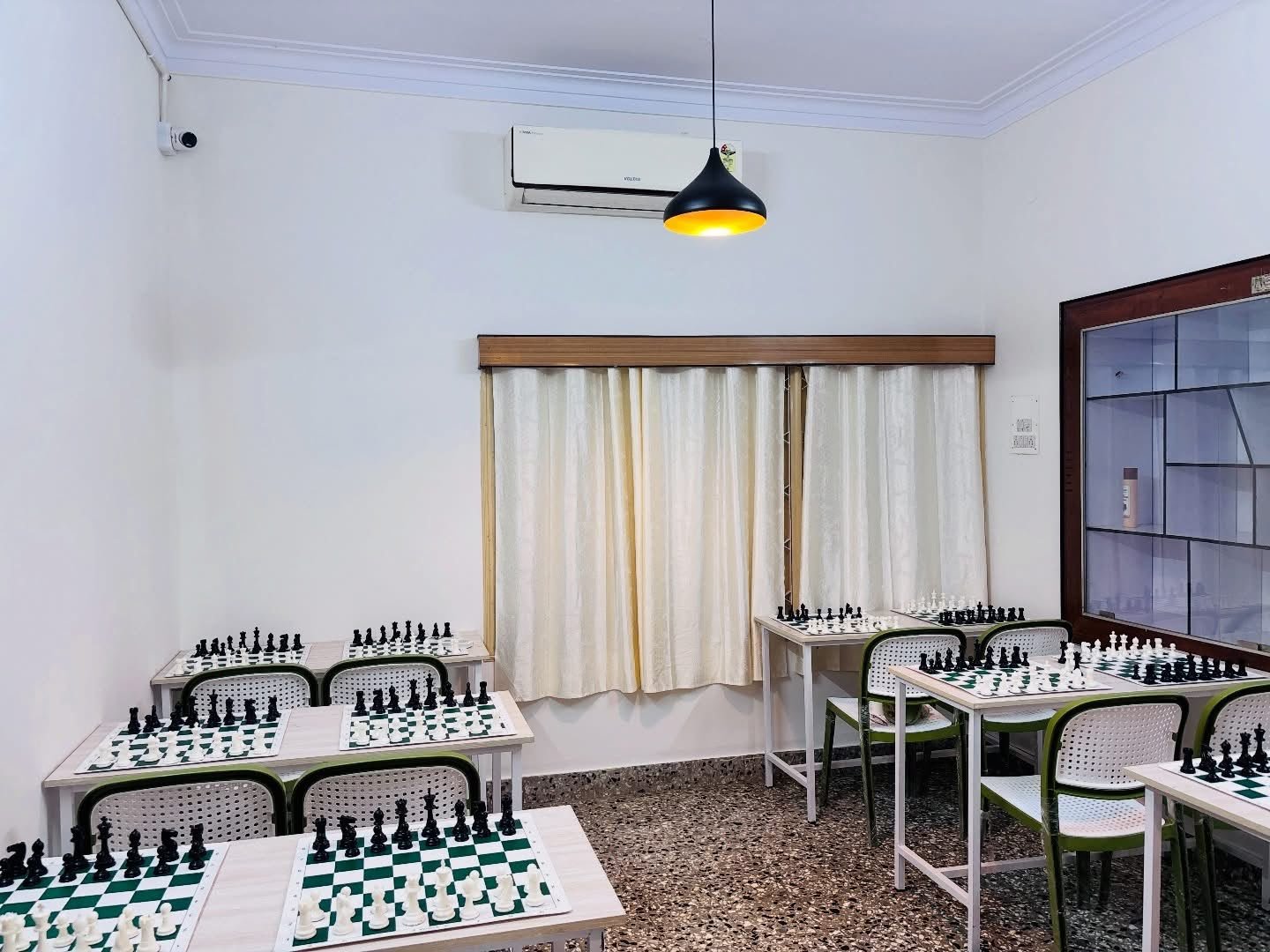 Bright Chess Forge classroom prepared with chessboards